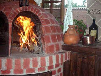 La Casa De Barro Lodge & Restaurant Chincheros  ภายนอก รูปภาพ